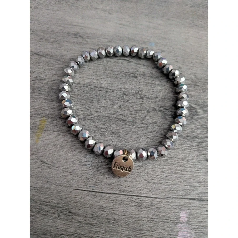 Erimish Faceted Metallic Silver Beaded Stretch Bracelet with Logo Charm